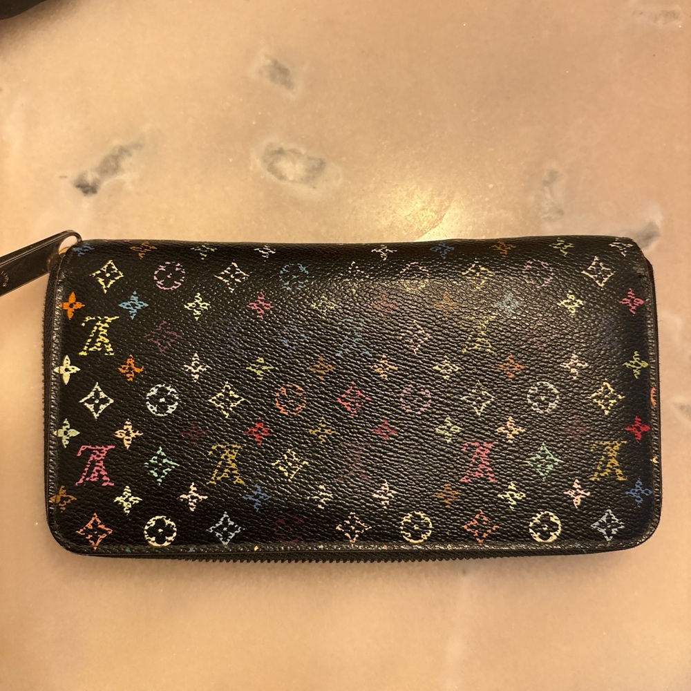 Louis Vuitton Black Multicolor Monogram Wallet
100% Authentic
